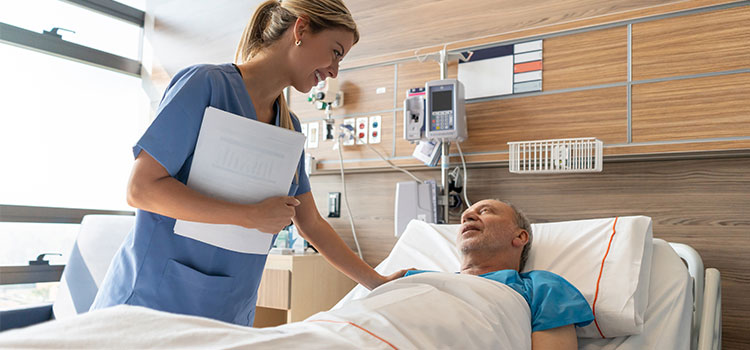 Nurse with patient in hospital