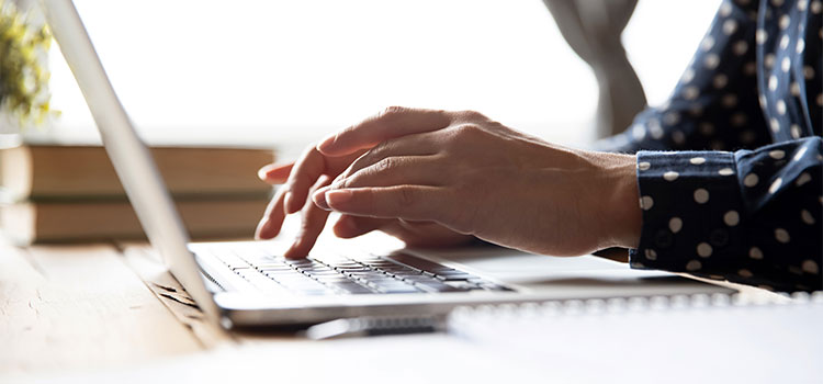 student doing research into nursing programs