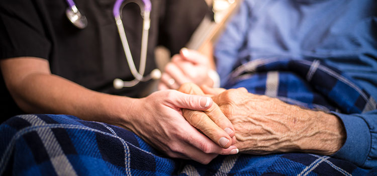 hospice nurse with patient
