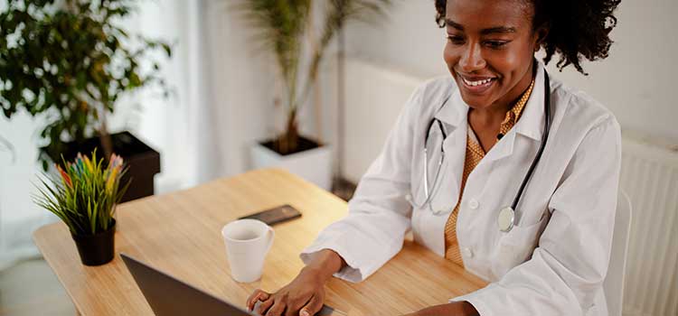 woman on laptop at desk