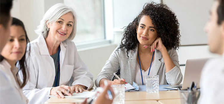 nurse administrator with medical staff