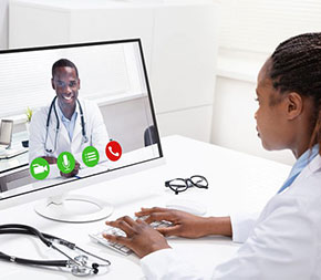 doctors talking to each other via video chat