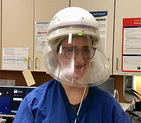 kathryn dailey-deaton wearing personal protection visor in hospital room