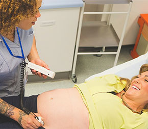 nurse midwife with patient