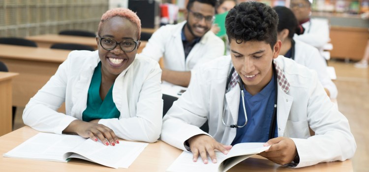 group of nurses studying for exams