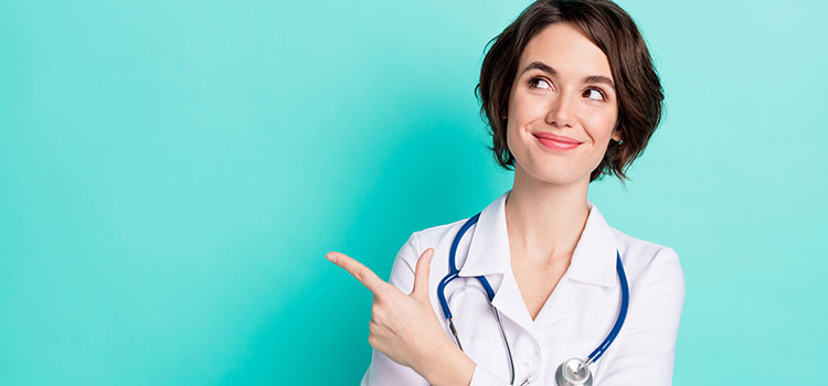 smiling nurse pointing at specialties