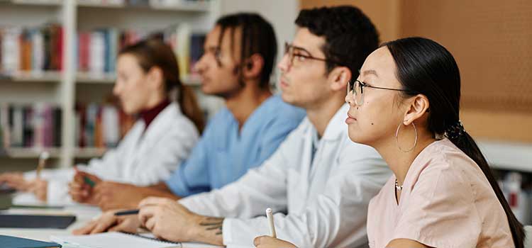 nursing students listen to lecture inclassroom