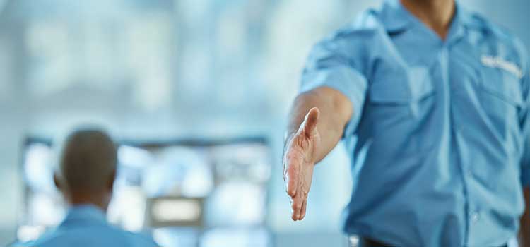 recruiter holds out hand for handshake